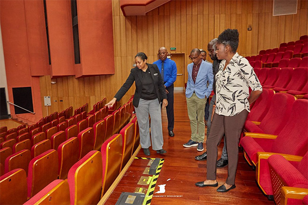 Photo 2: Minister Benjamin is given a walkthrough of an auditorium at SAPA during her official tour of the facility on Tuesday July 15, 2025.
